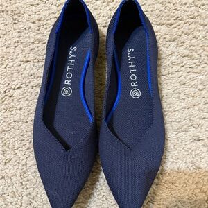 Rothy's Elegant Dark Blue pointed toe flats.
